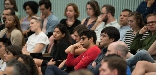 Group of people listening to a lecture