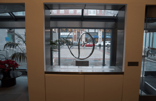 view of the metal spiral sculpture in Annenberg front lobby