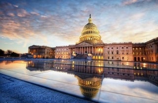 U.S. Capitol Building with reflective pool in front