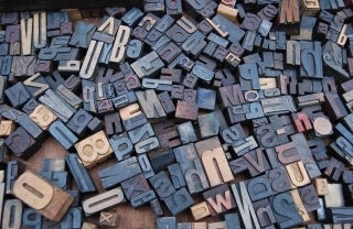 Image of Letter Blocks Scattered Around, photo credit Amador Loureiro / Unsplash