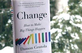 Change: How to Make Big Things Happen book with snowy trees in background, photo credit Damon Centola / Instagram