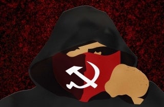 image of person in hoodie holding red shield in front of face