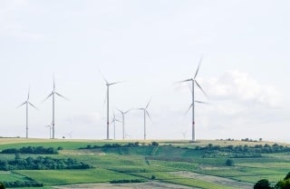 photo of a wind farm, photo credit Karsten Wurth / Unsplash