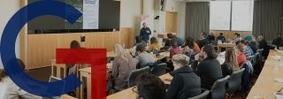 CARGC members listening to a lecture