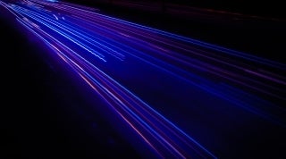 DIG Fullwidth 1920x1070 Photo Credit to Clyde He on Unsplash.jpg Abstract image of blue lights that give the sensation of movement, Photo Credit to Clyde He on Unsplash