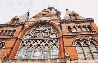 low angle shot of a brick building at Harvard, photo credit Erin Doering / Unsplash