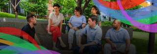 Six people sitting together outdoors on Penn campus