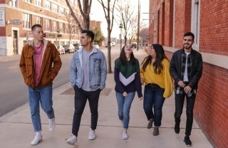 Stock photo of teenagers walking