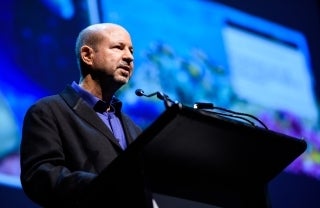 Michael E. Mann standing at podium