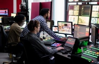 Broadcast Engineers in a control room of a BBC channel broadcast