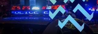 Police car with lights on at night. Michael Förtsch on Unsplash.