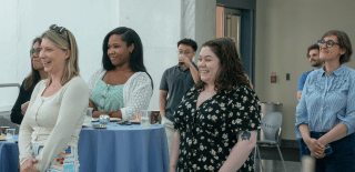 Annenberg staff stand in the plaza during a reception