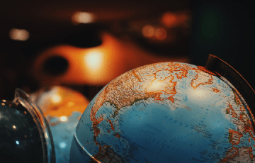 Photo of a globe. Photo credit: Juliana Kozoski / Unsplash
