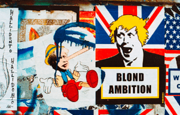 political discourse and its consequences Photo Credit Annie Sprat on Unsplash 360 x 230 crop.png Posters of Boris Johnson as Pinnocohio and in Pop art style with the caption 'Blond Ambition'. Photo Credit: Annie Sprat / Unsplash
