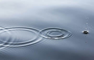 Water droplet and ripples 360 x 230.jpg Droplet in a body of water with circular ripples adjacent