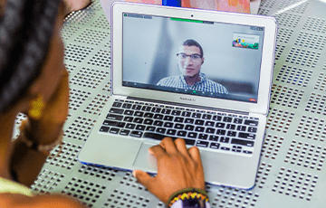 Woman having a zoom call on her laptop