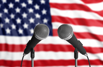 debate mics 1920.png Pulpit with microphones and USA flag in background