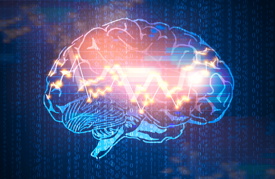 conceptional image of a brain interposed with computer chips