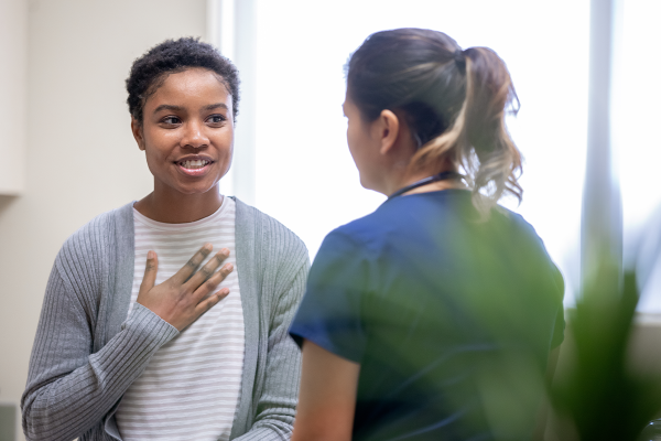 Female doctor talking to patient