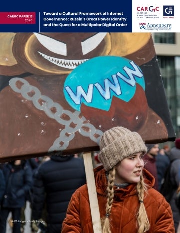 Woman at protest with sign