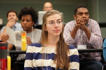 Lizzie Martin in class with students behind her