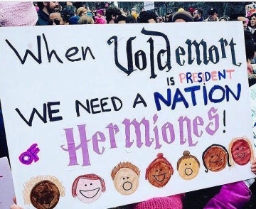 Sign reading "When Voldemort is President, we need a nation of Hermiones"