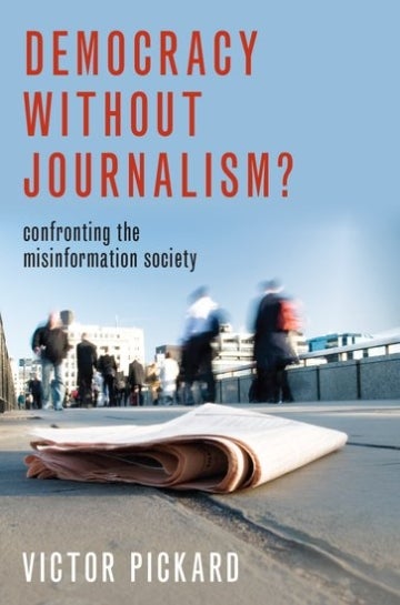 Book cover of "Democracy Without Journalism?" by Victor Pickard showing a newspaper in the middle of the street