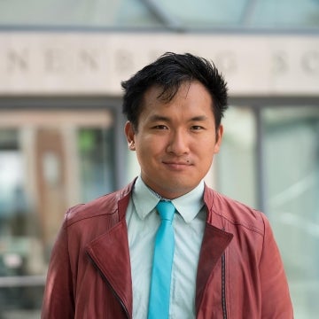 Danny Kim posing in front of Annenberg School For Communication Building