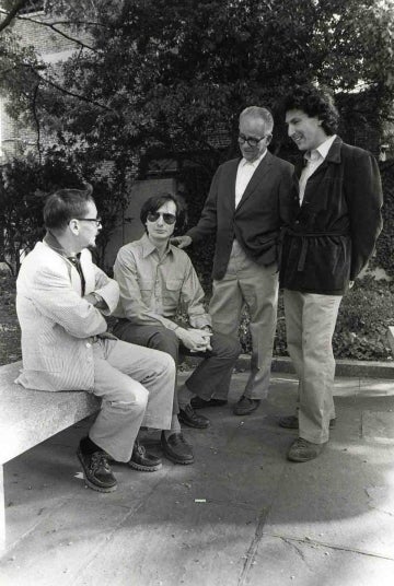 Photo of Charles Wright, Paul Messaris, and Ray Birdwhistell with a student