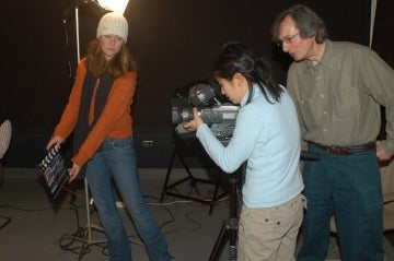 Paul Messaris and students on the set of a film for class