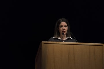 Ashley Parker speaking behind a podium