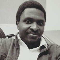 Headshot of James Yékú